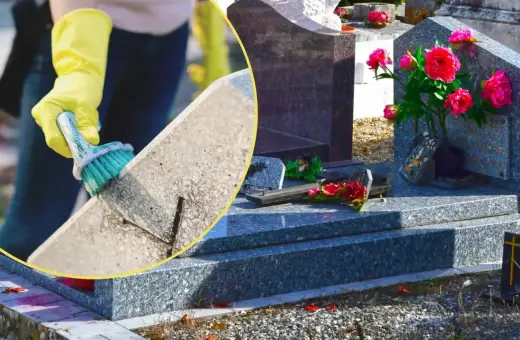 Rękawiczki i szczotka pomagają w zadaniu, jak usunąć wosk z pomnika. Cmentarz z nagrobkami i kwiatami.